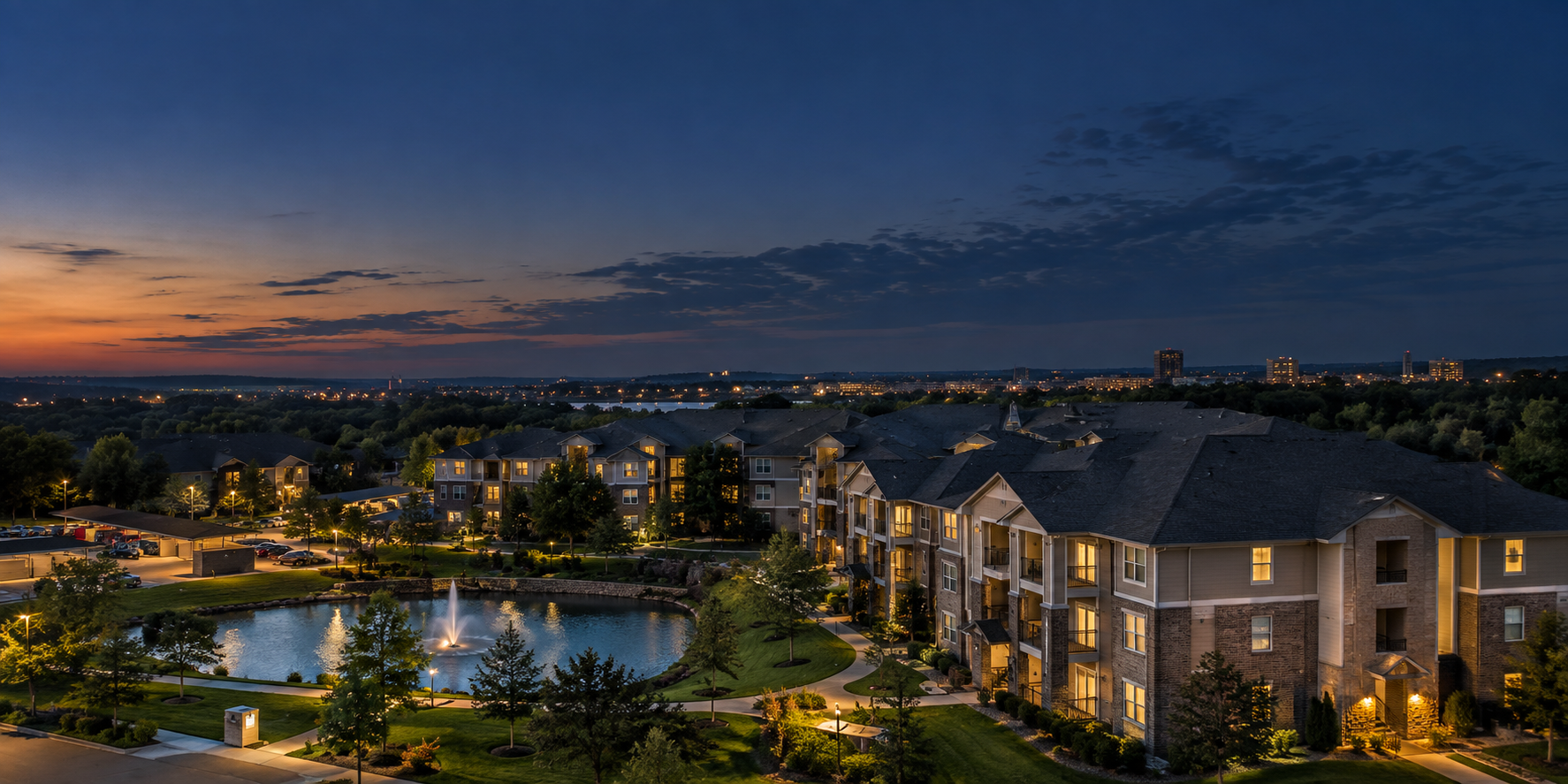 A well-maintained multifamily community at dusk